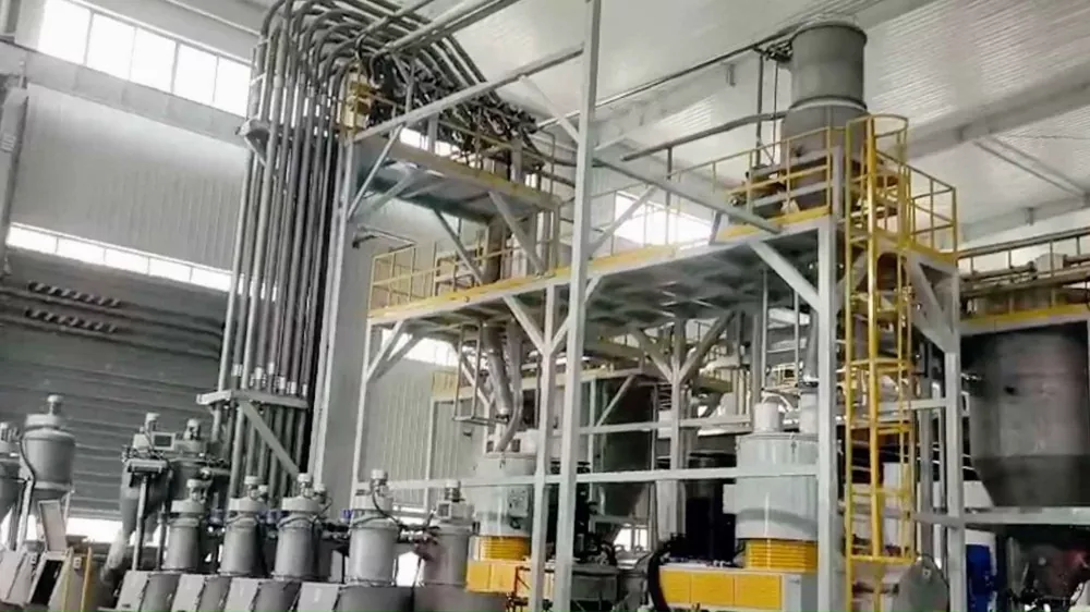 Sistema di alimentazione materiale centralizzato